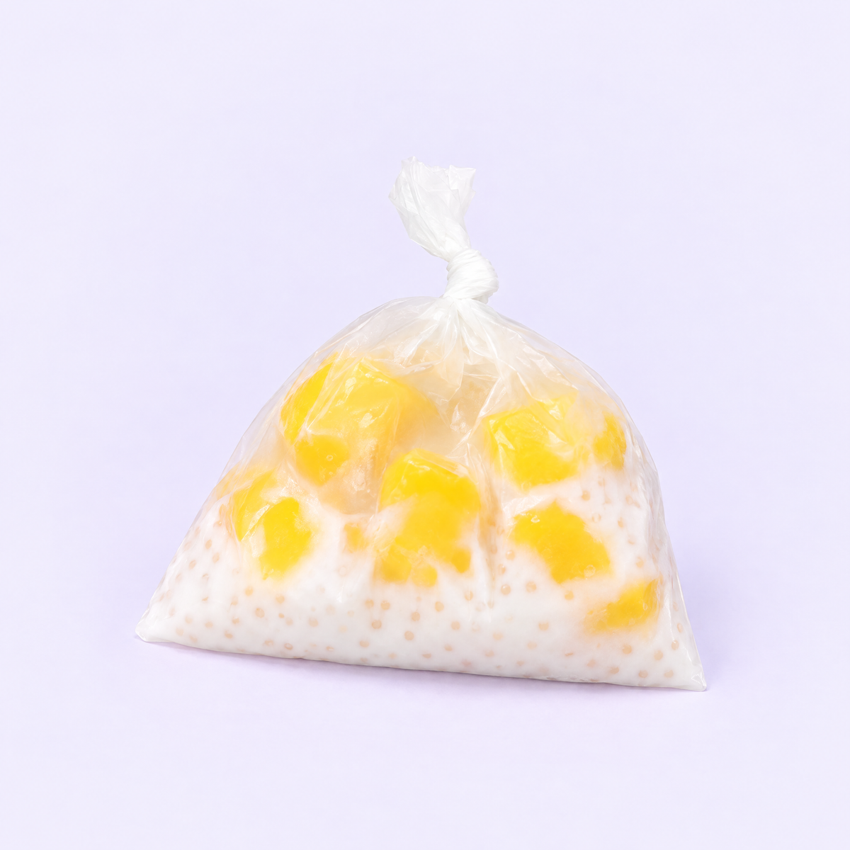 Mango pomelo sago crispy squishy in a tied bag, handmade by Crinklet